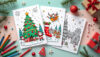 Child coloring detailed holiday ornaments on printable Christmas Coloring Pages