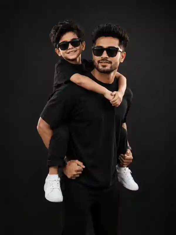 boys ai prompts studio black background father son 3.webp Studio father son portrait black background created using boys ai prompts