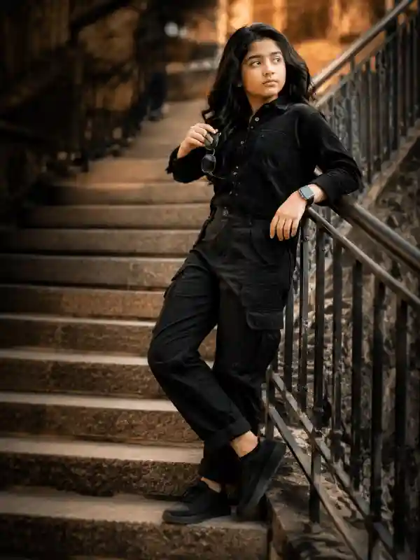 gemini ai photo prompts girl black outfit stairs portrait 1.webp Trendy girl in black outfit standing on stairs created using gemini ai photo prompts girl trending