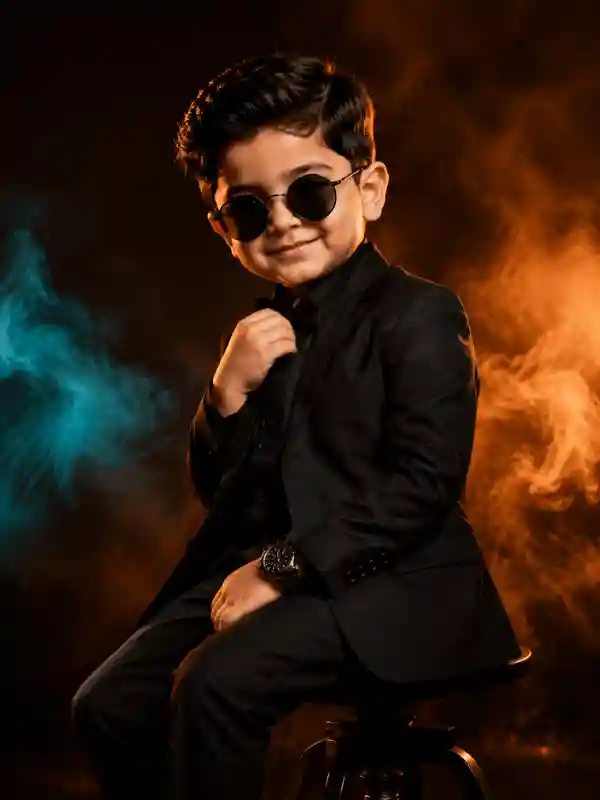 Boy in black suit fashion pose with sunglasses created using gemini prompt for boys