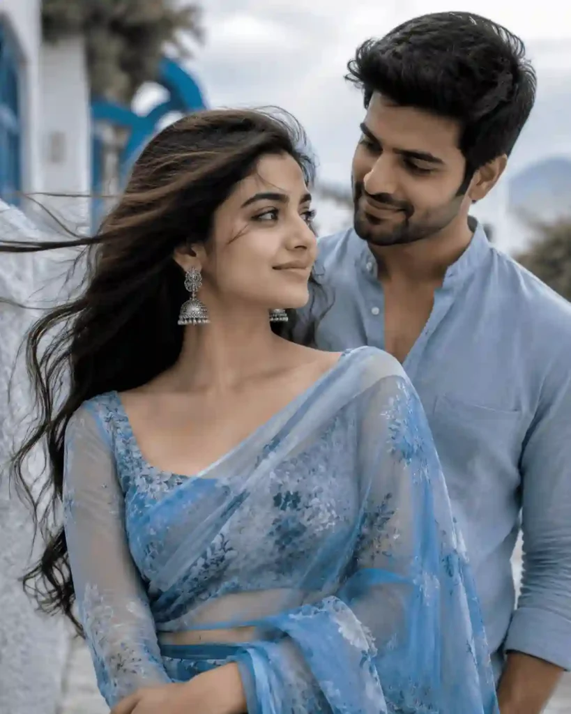 windy saree couple portrait.webp Young couple portrait with flowing hair and blue floral chiffon saree