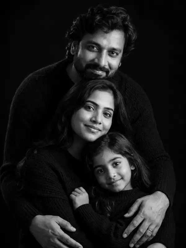 chatgpt family photo prompt fine art portrait.webp ChatGPT family photo prompt for a fine-art black-and-white portrait of an Indian family of three