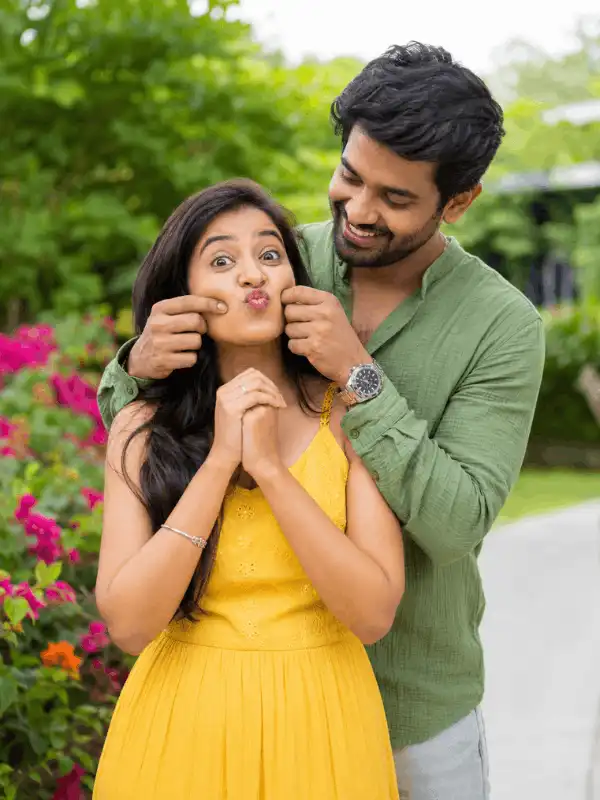 indian couple prompt for gemini ai free cheerful garden pose.webp Indian couple prompt for Gemini AI free featuring a cheerful garden pose with blooming